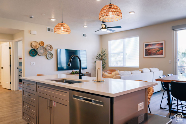 961 West Akoya Pearl Road, Unit 201 St. George, UT 84790 - Photo 8 of 67 Kitchen with wood finished floors, stainless steel dishwasher, light countertops, gray cabinetry, and recessed lighting