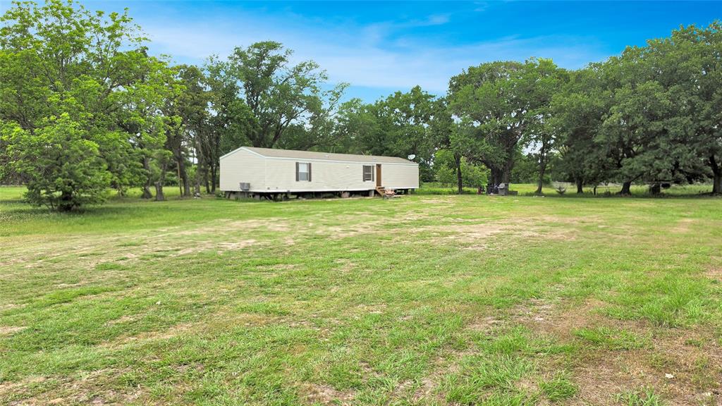 14628 Fm Road Scurry, TX 75158 - Photo 2 of 14 a view of a field with a trees