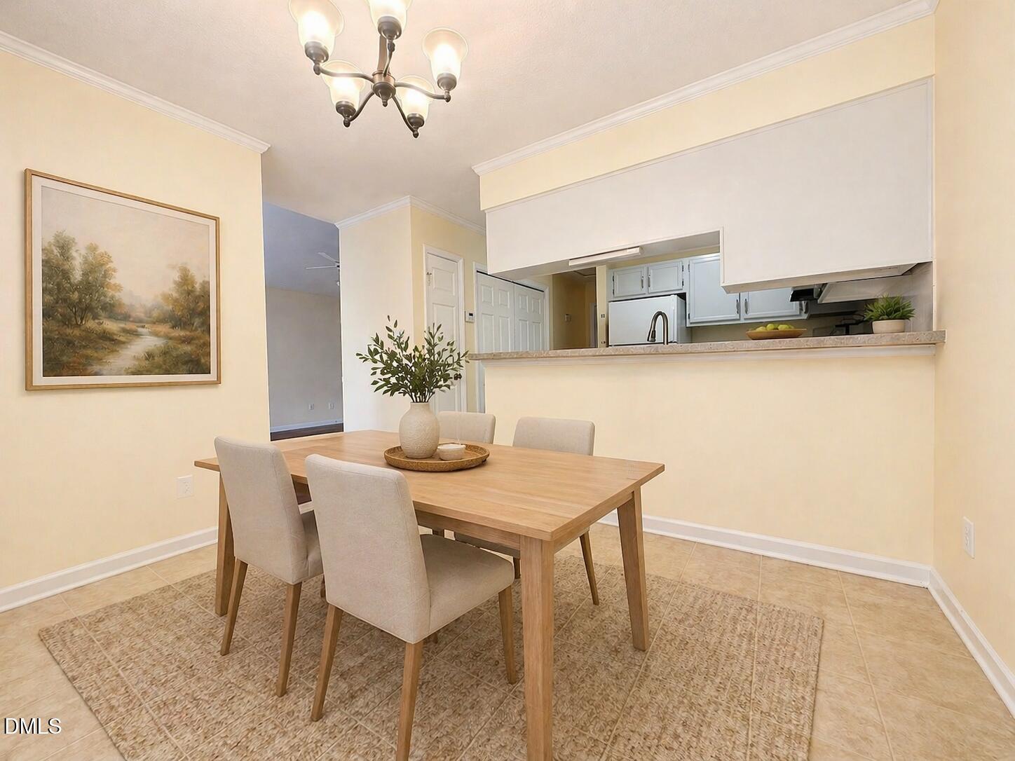 5010 Avenida Del Sol Drive Raleigh, NC 27616 - Photo 12 of 27 a view of a dining room with furniture
