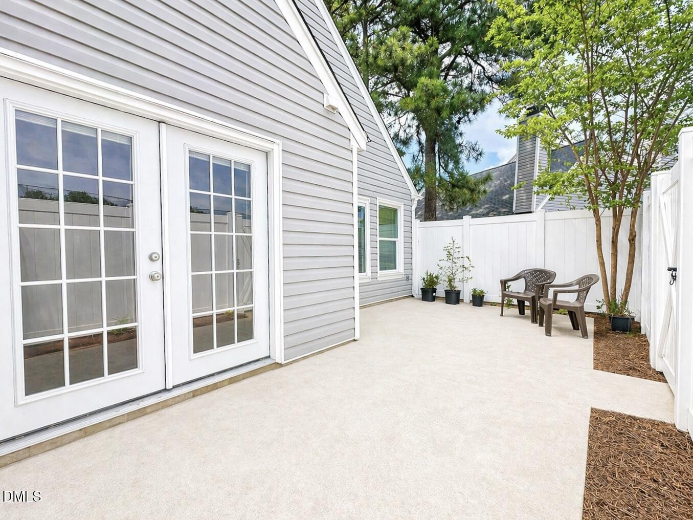 5010 Avenida Del Sol Drive Raleigh, NC 27616 - Photo 23 of 27 a view of a house with a yard and sitting area