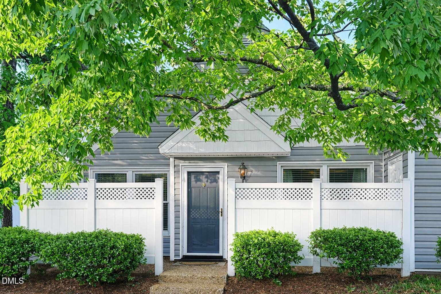 5010 Avenida Del Sol Drive Raleigh, NC 27616 - Photo 2 of 27 a house with a tree in front of it