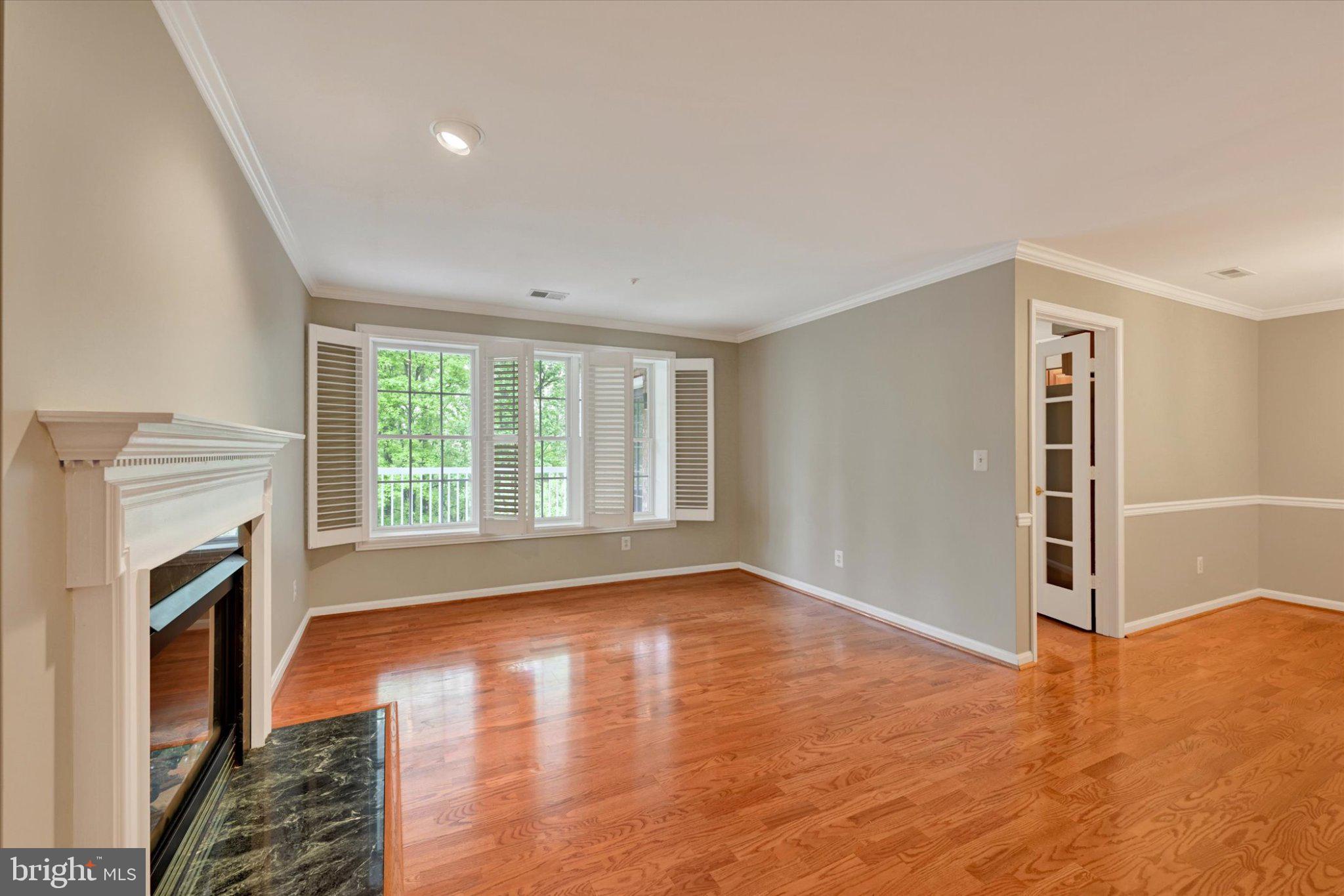 12310 Rosslare Ridge Road, Unit 405 Lutherville-Timonium, MD 21093 - Photo 6 of 36 Bright and airy living space awaits.