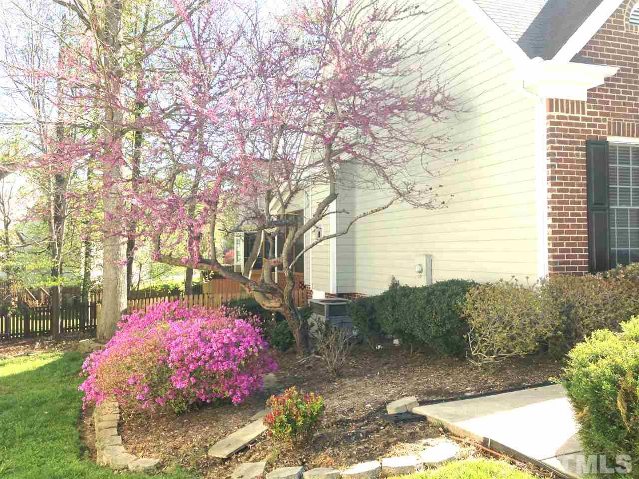 8705 Paddle Wheel Drive Raleigh, NC 27615 - Photo 22 of 22 a front view of a house with a yard