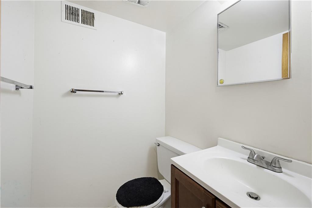 4188 Cedar Valley Lane Conley, GA 30288 - Photo 16 of 28 a bathroom with a sink and a vanity