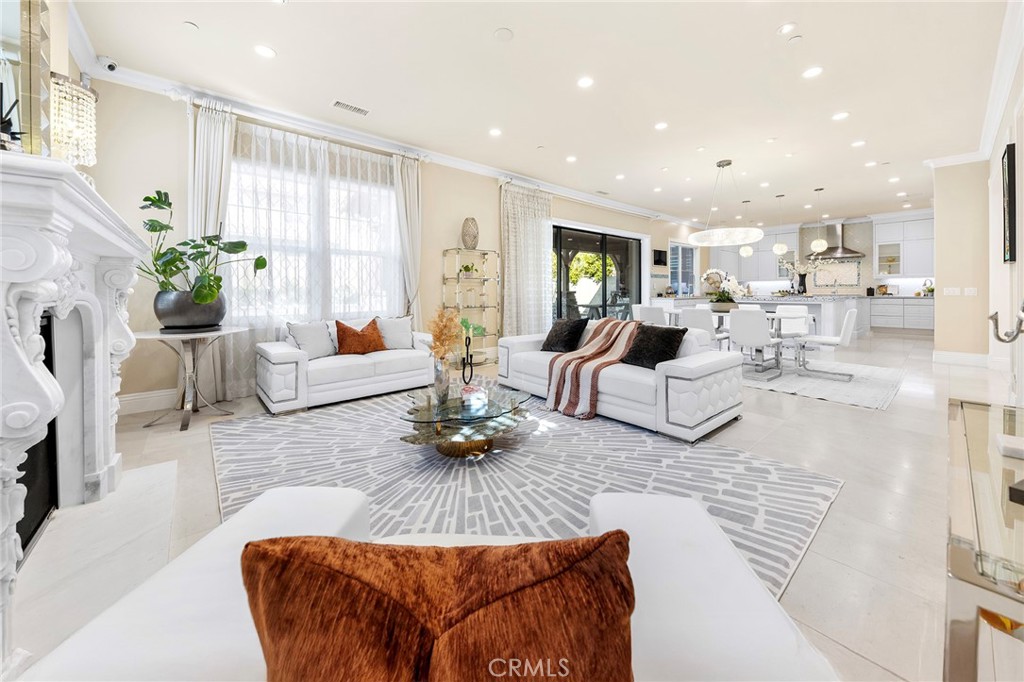 123 Calderon Irvine, CA 92618 - Photo 15 of 74 a living room with furniture fireplace and a table