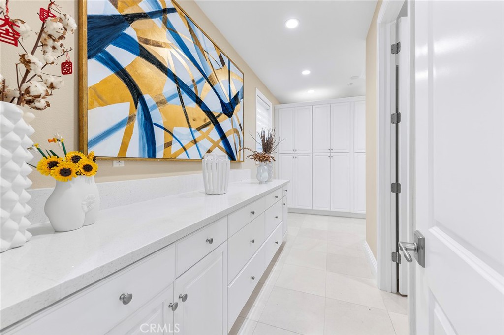 123 Calderon Irvine, CA 92618 - Photo 27 of 74 a bathroom with a sink and mirror