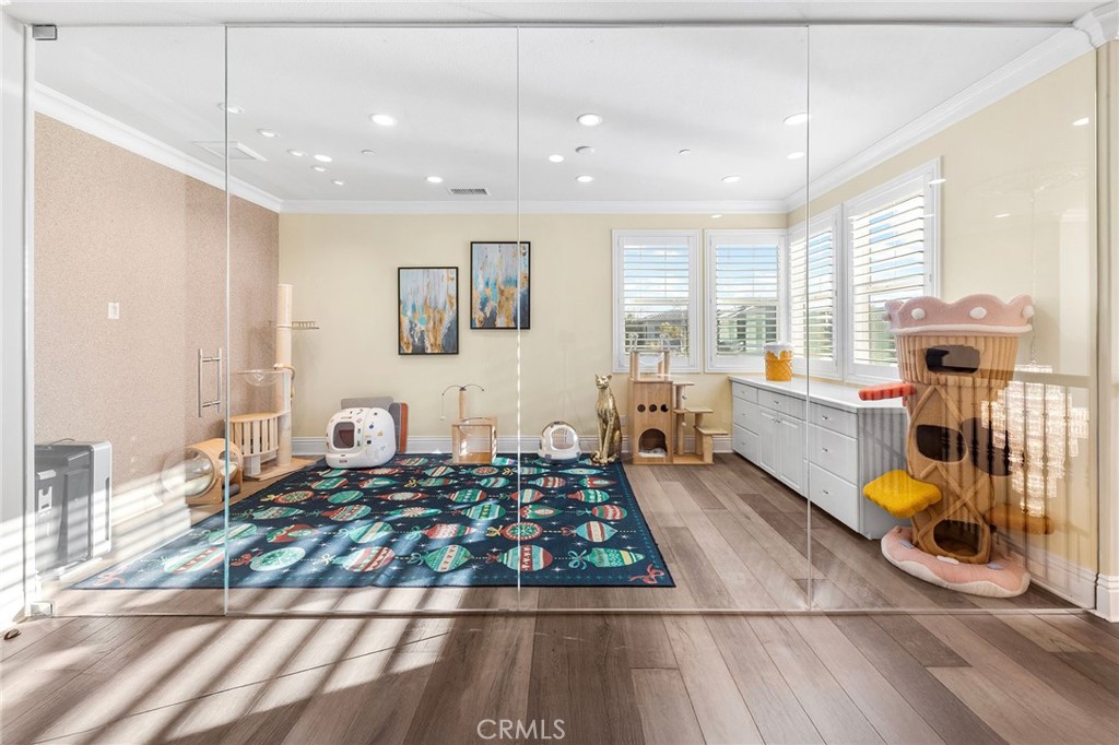 123 Calderon Irvine, CA 92618 - Photo 33 of 74 a living room with a couch and a table with wooden floor