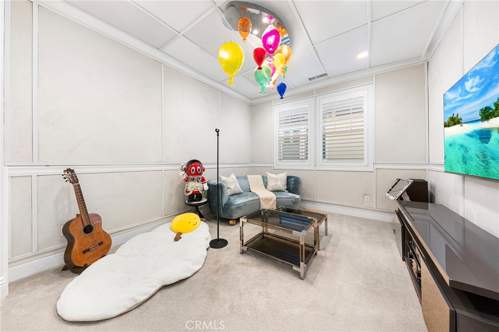 123 Calderon Irvine, CA 92618 - Photo 46 of 74 a living room with furniture and a table