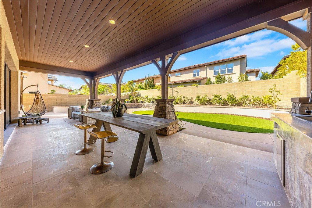 123 Calderon Irvine, CA 92618 - Photo 59 of 74 a view of a room with table and chairs