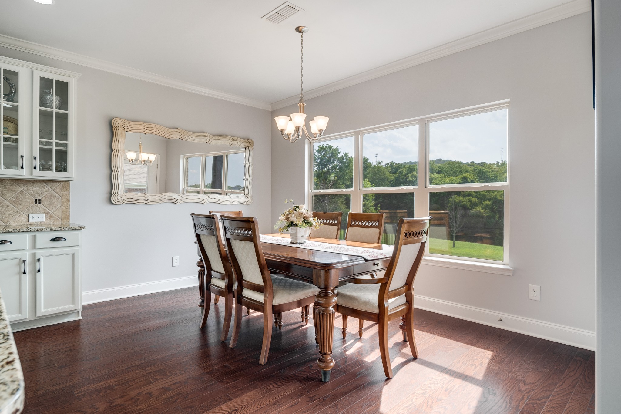 238 Fowler Circle Franklin, TN 37064 - Photo 15 of 45 a dining room with furniture window and wooden floor