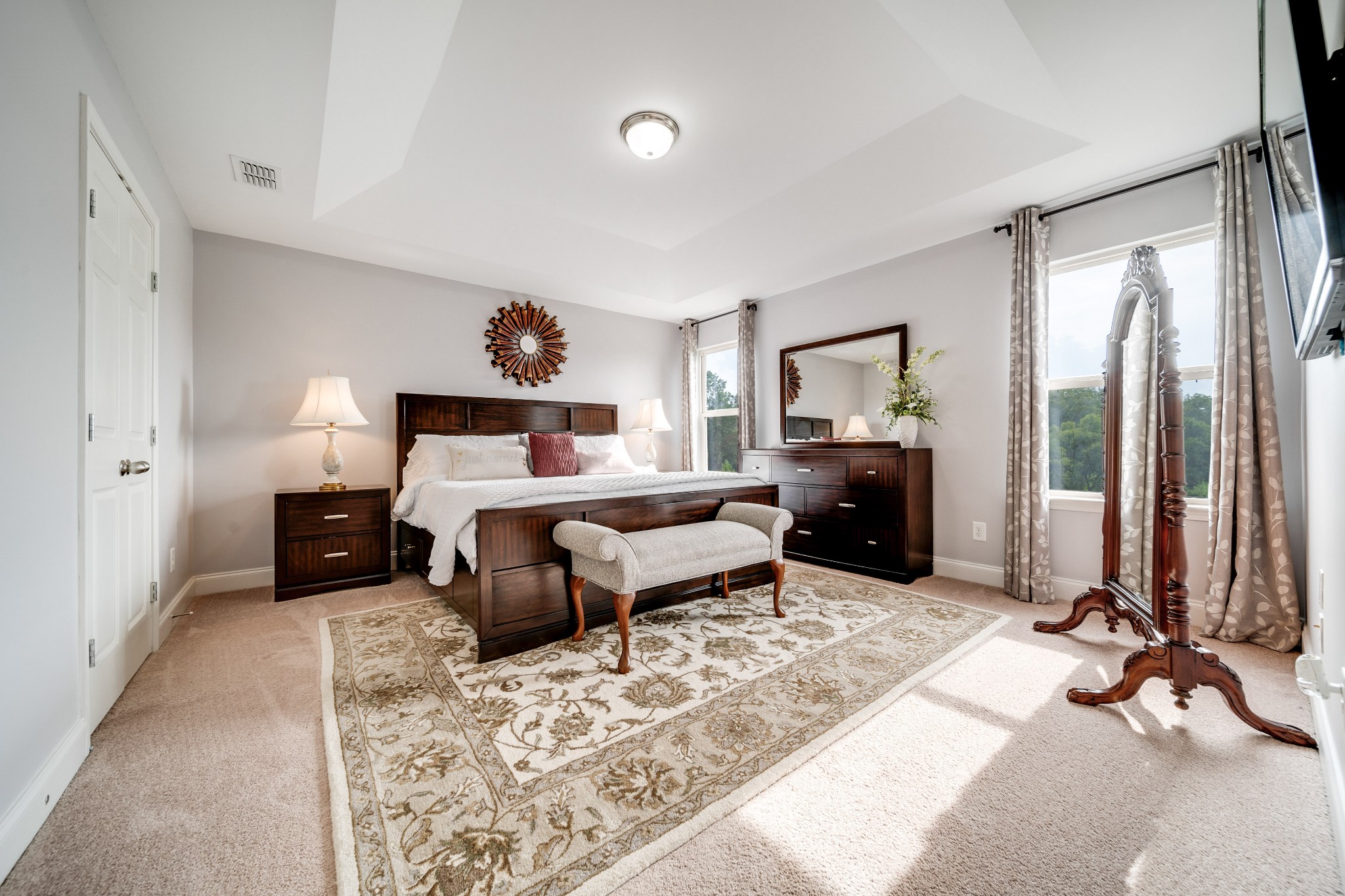 238 Fowler Circle Franklin, TN 37064 - Photo 16 of 45 a bedroom with a bed and a chandelier