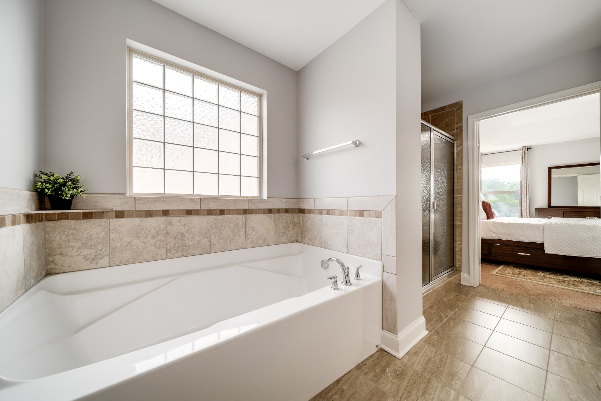 238 Fowler Circle Franklin, TN 37064 - Photo 18 of 45 a bathroom with a bathtub and a shower