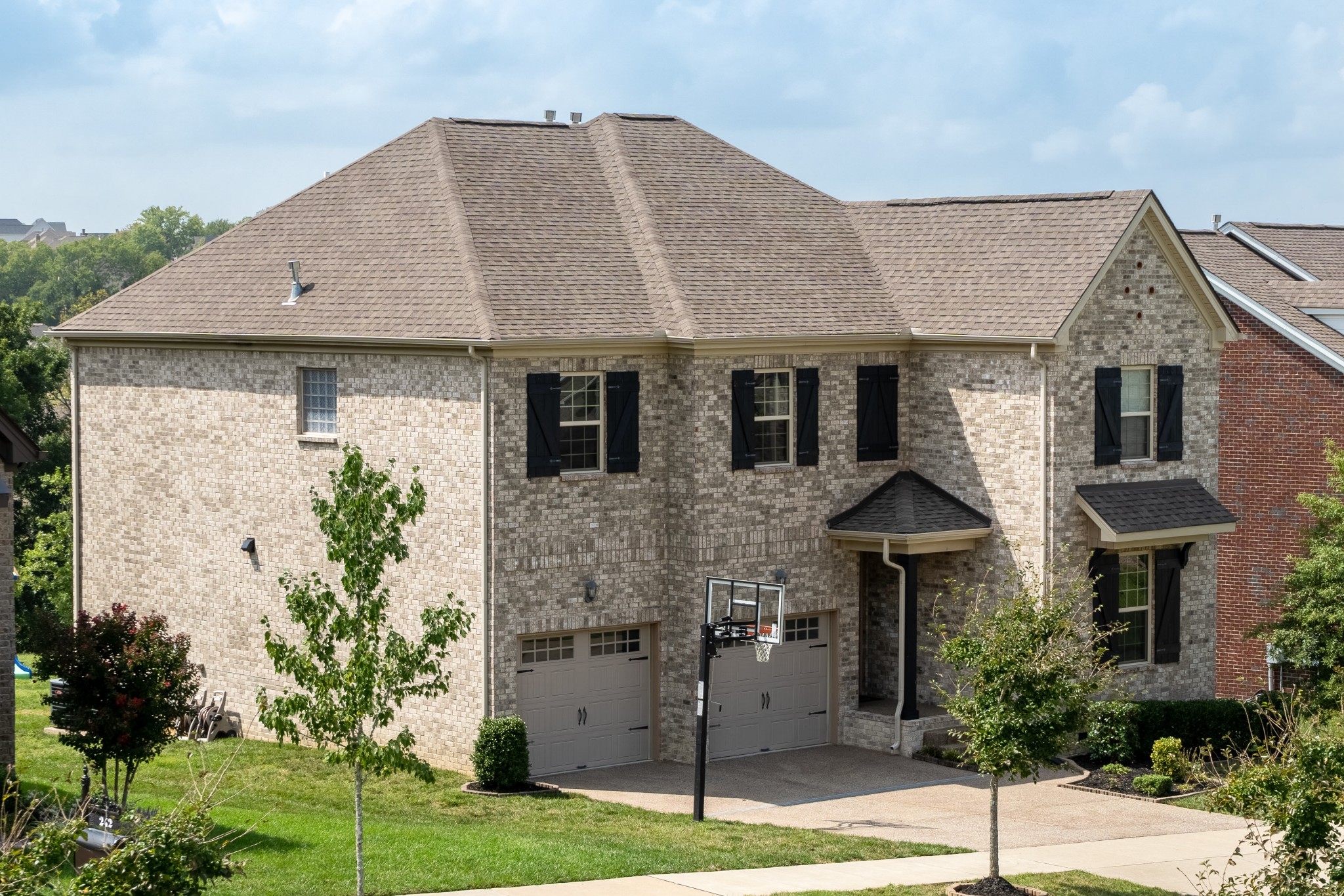 238 Fowler Circle Franklin, TN 37064 - Photo 3 of 45 a front view of a house with a yard