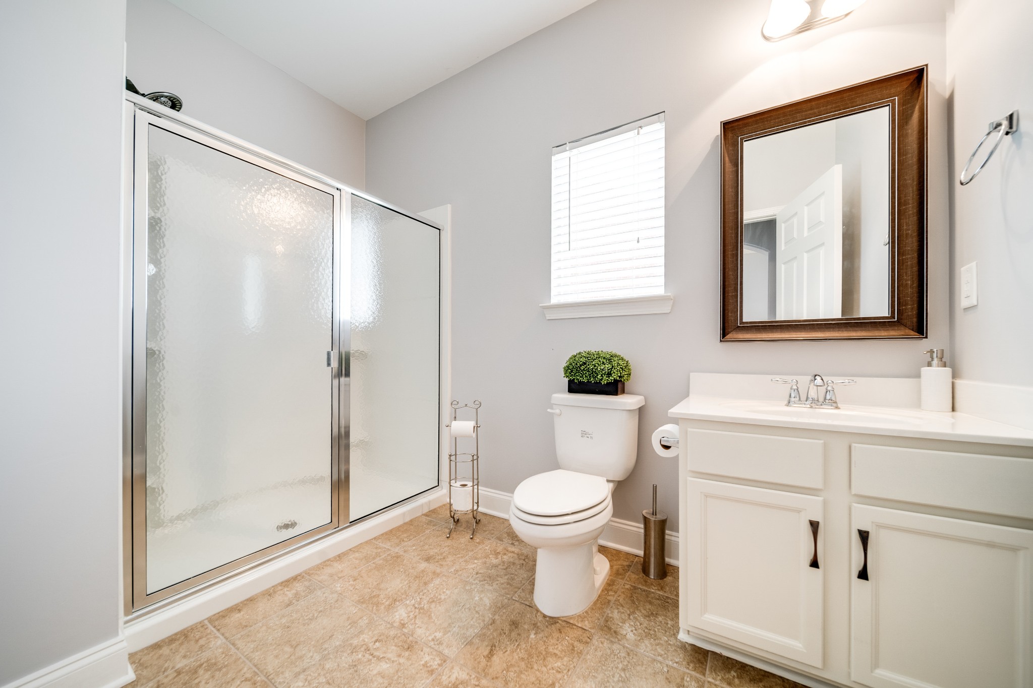 238 Fowler Circle Franklin, TN 37064 - Photo 9 of 45 a bathroom with a toilet sink and shower