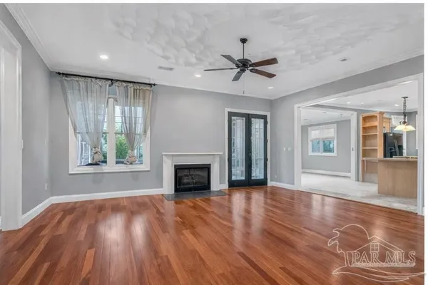 a view of a swimming pool with a patio