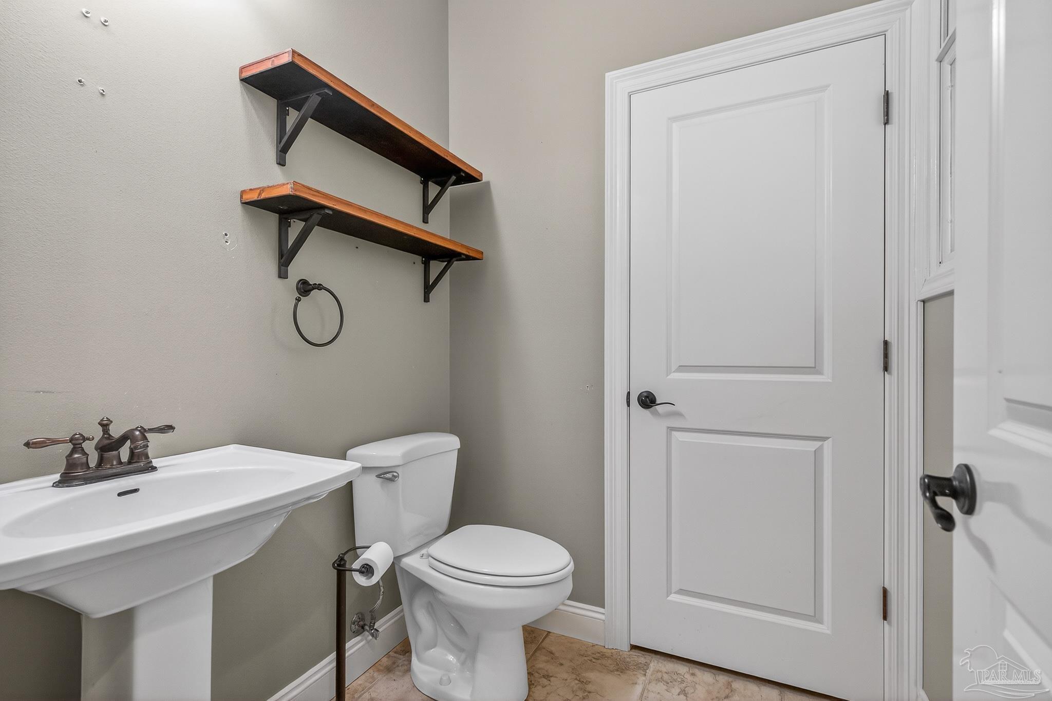 78 Hummingbird Lane Atmore, AL 36502 - Photo 43 of 55 a bathroom with a sink toilet and shower