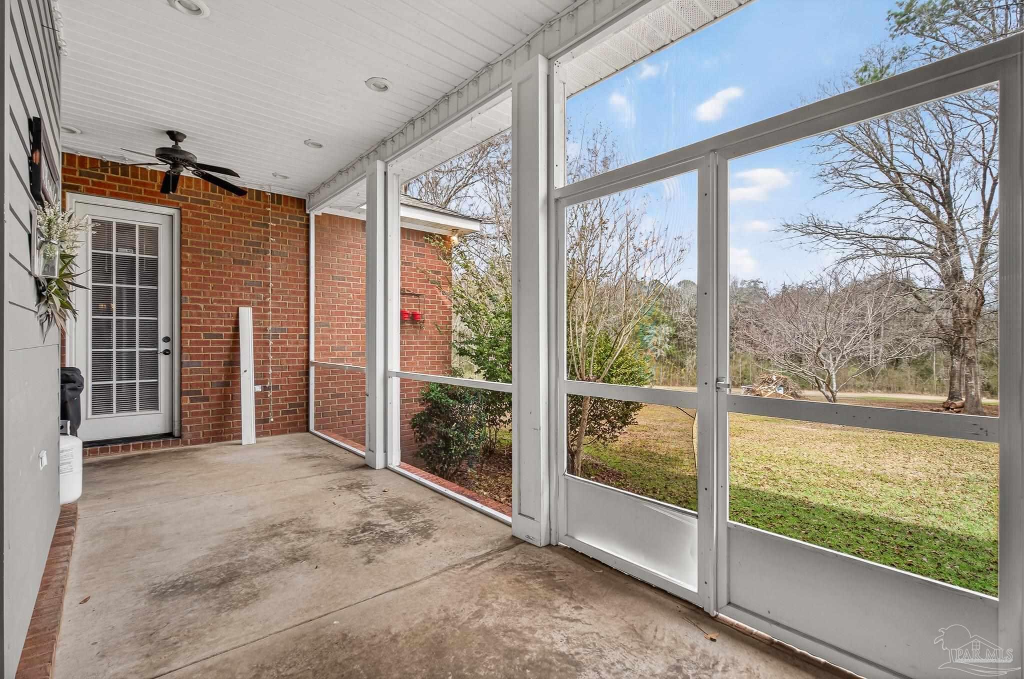 78 Hummingbird Lane Atmore, AL 36502 - Photo 46 of 55 a view of an empty room with a large window