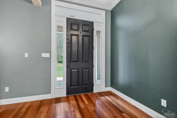a kitchen with stainless steel appliances granite countertop a sink and refrigerator