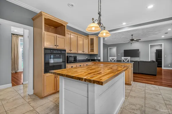 a view of a kitchen with cabinets