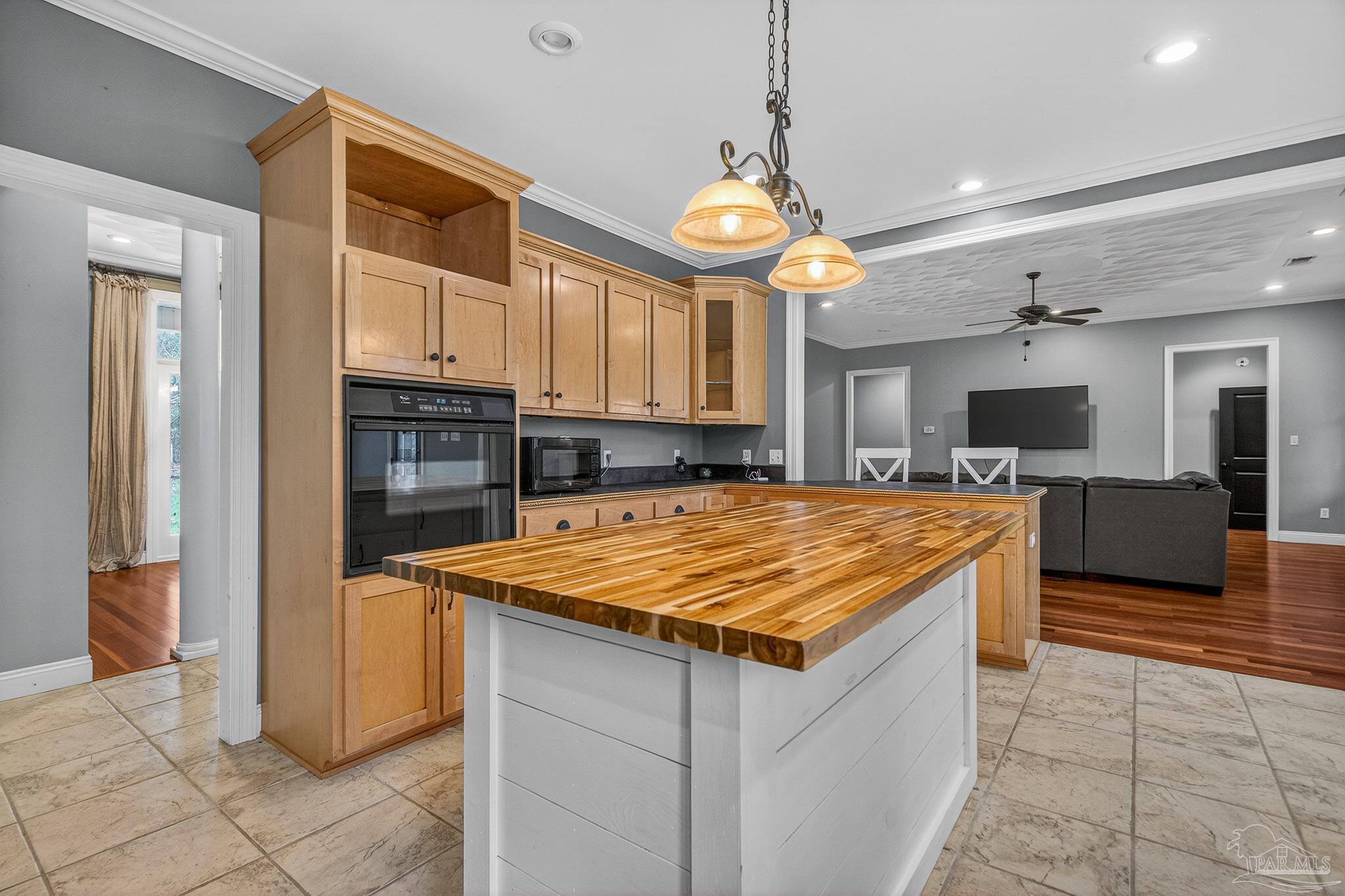 78 Hummingbird Lane Atmore, AL 36502 - Photo 10 of 55 a kitchen with stainless steel appliances granite countertop a sink and a refrigerator