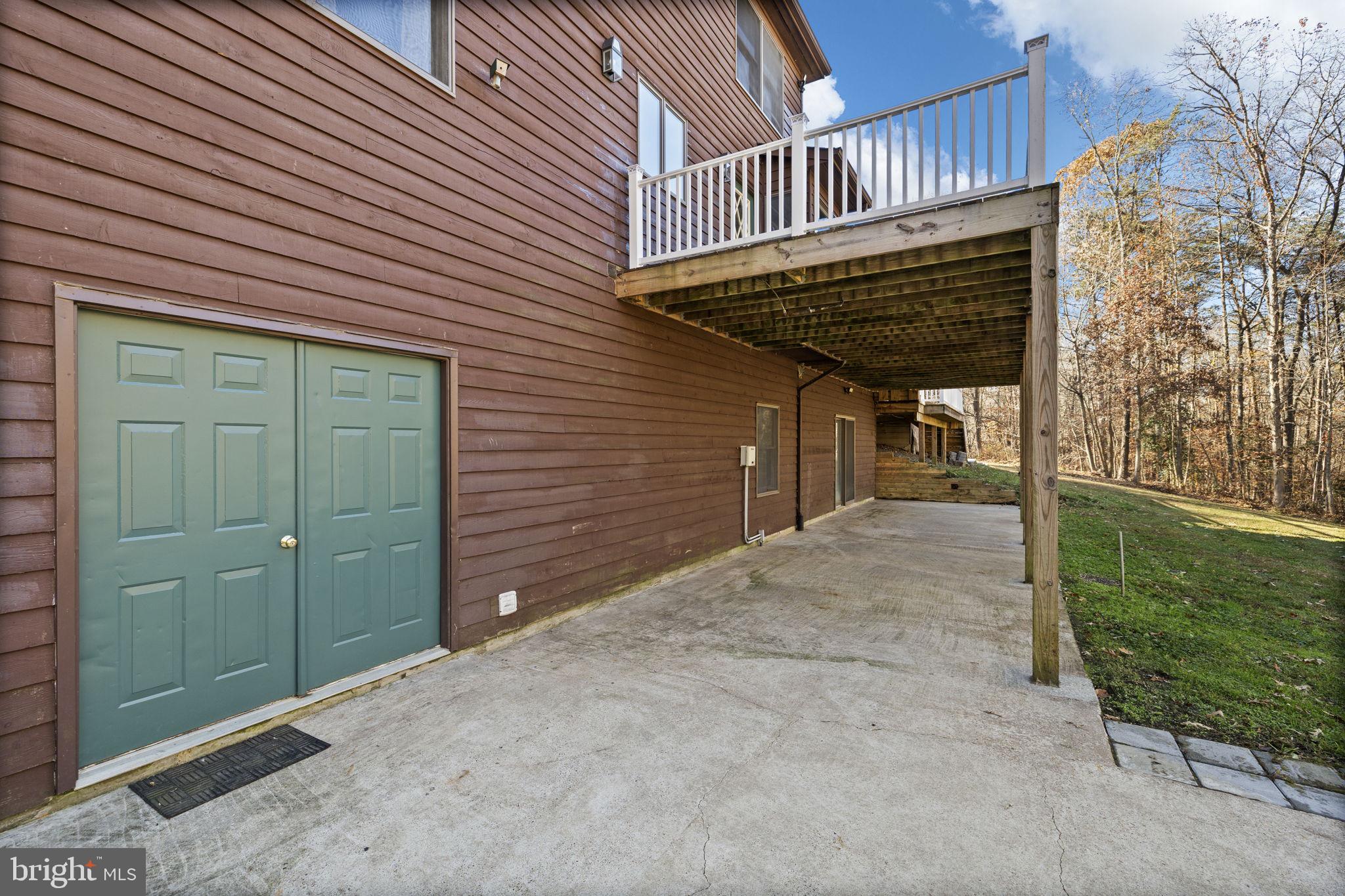 4075 Red Gate Lane King George, VA 22485 - Photo 12 of 69 a view of a porch with wooden stairs
