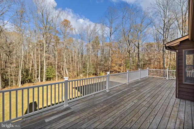 a view of front door with wooden floor