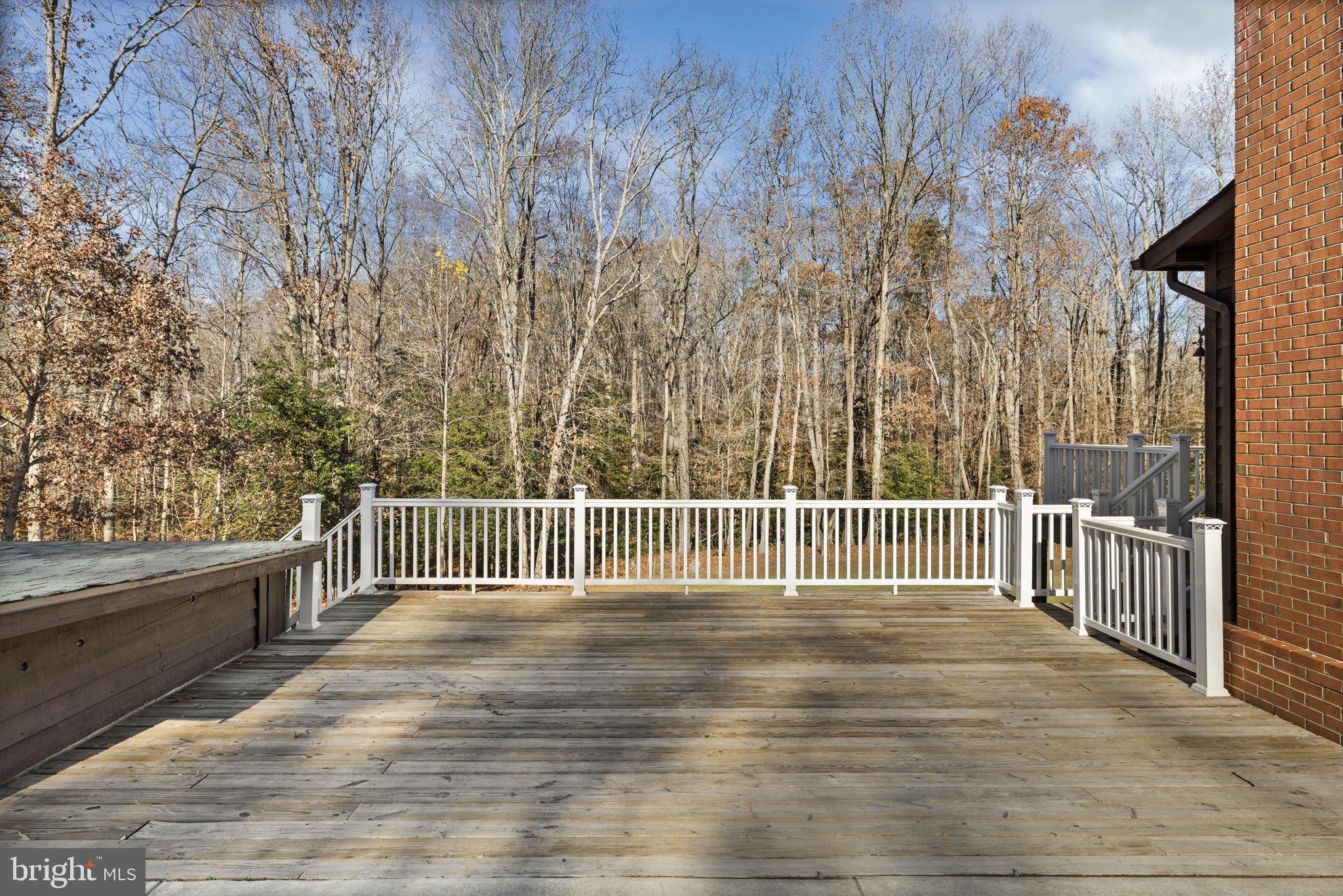4075 Red Gate Lane King George, VA 22485 - Photo 15 of 69 a view of a balcony with wooden floor