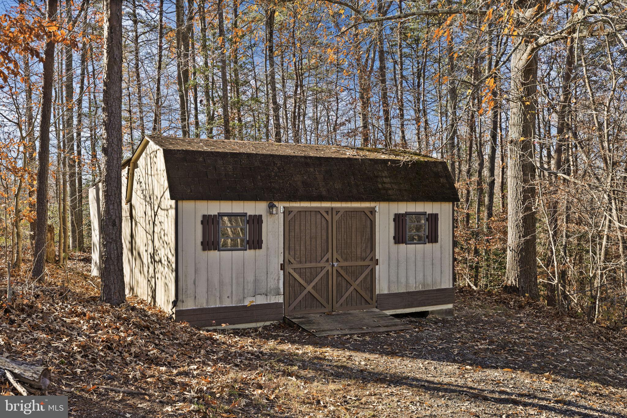 4075 Red Gate Lane King George, VA 22485 - Photo 21 of 69 a front view of a house with garden