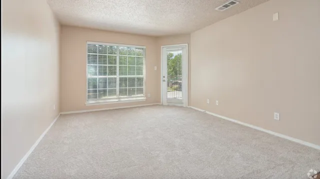 an empty room with a window