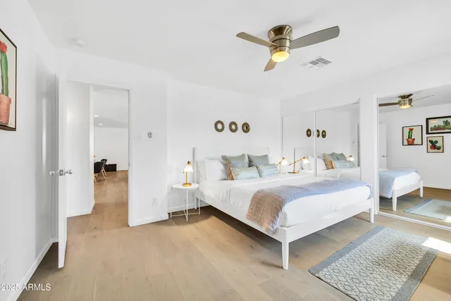 a patio with a table and chairs