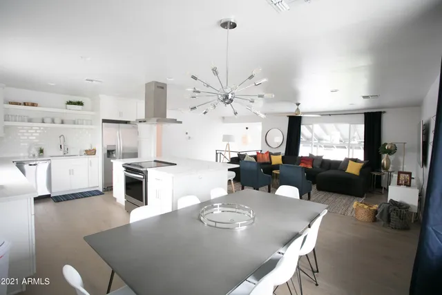 a bathroom with a shower and vanity