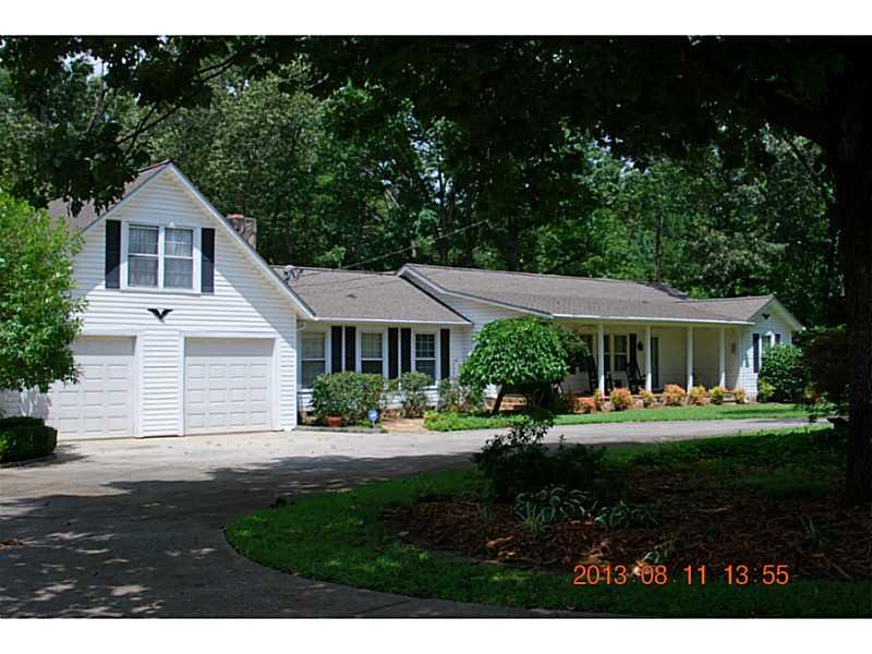 14 Law House Road Toccoa, GA 30577 - Photo 1 of 1 a front view of a house with a yard