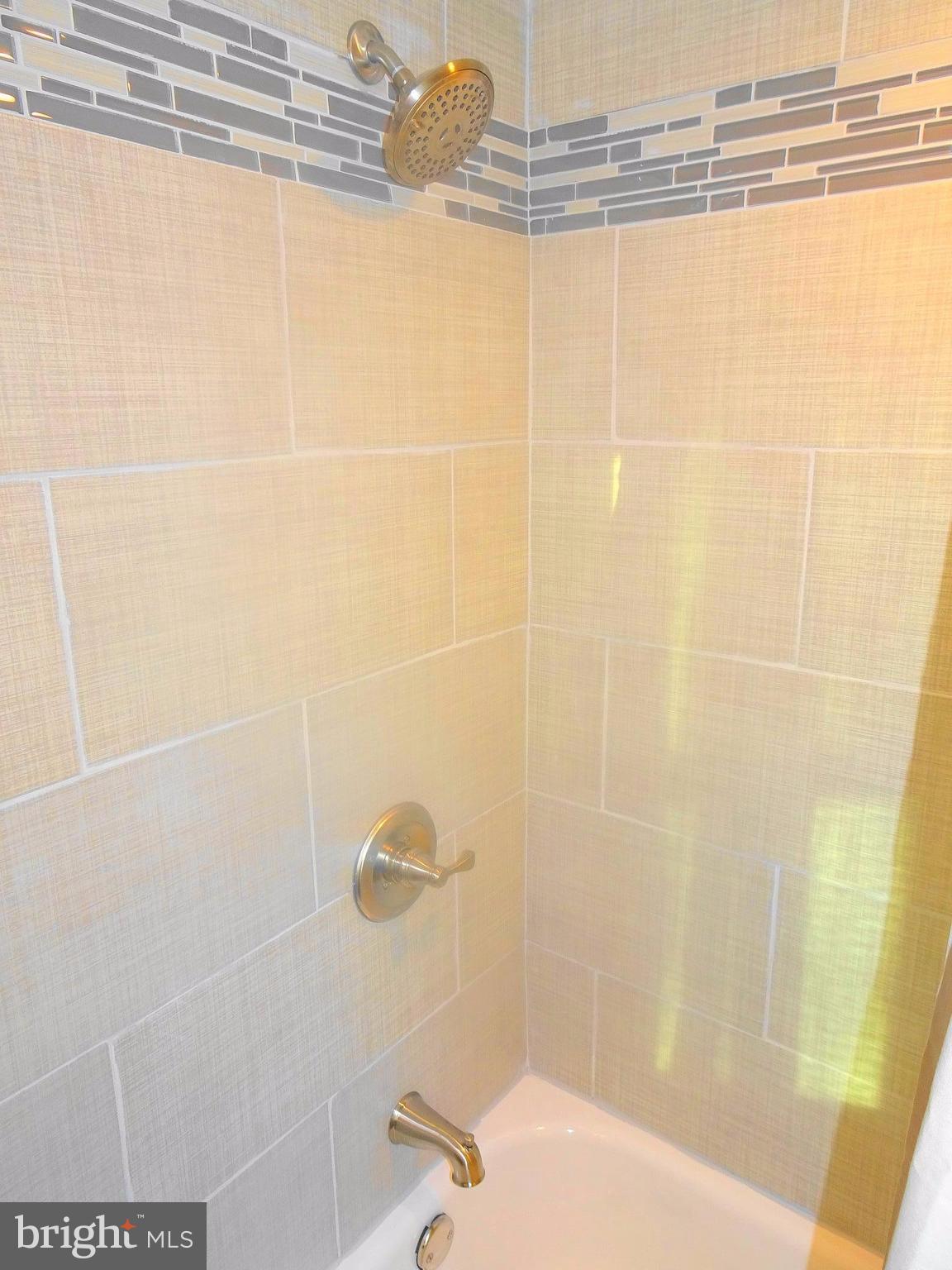 1406 Meridene Drive Baltimore, MD 21239 - Photo 12 of 30 a bathroom with a shower