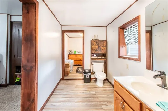 a view of a kitchen from the hallway