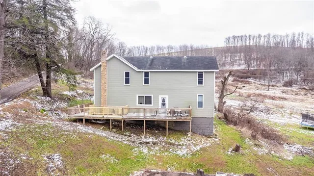 a view of a lake with a house