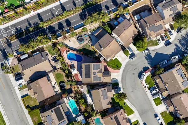 aerial view of a house with a swimming pool