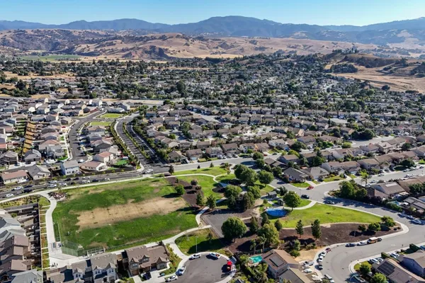 an aerial view of a city with lots of residential buildings