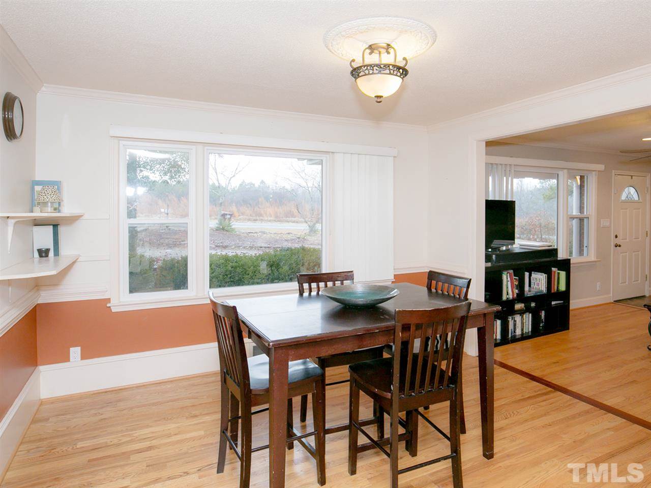 3628 Edgemont Road Wendell, NC 27591 - Photo 4 of 17 a view of a dining room with furniture window and outside view