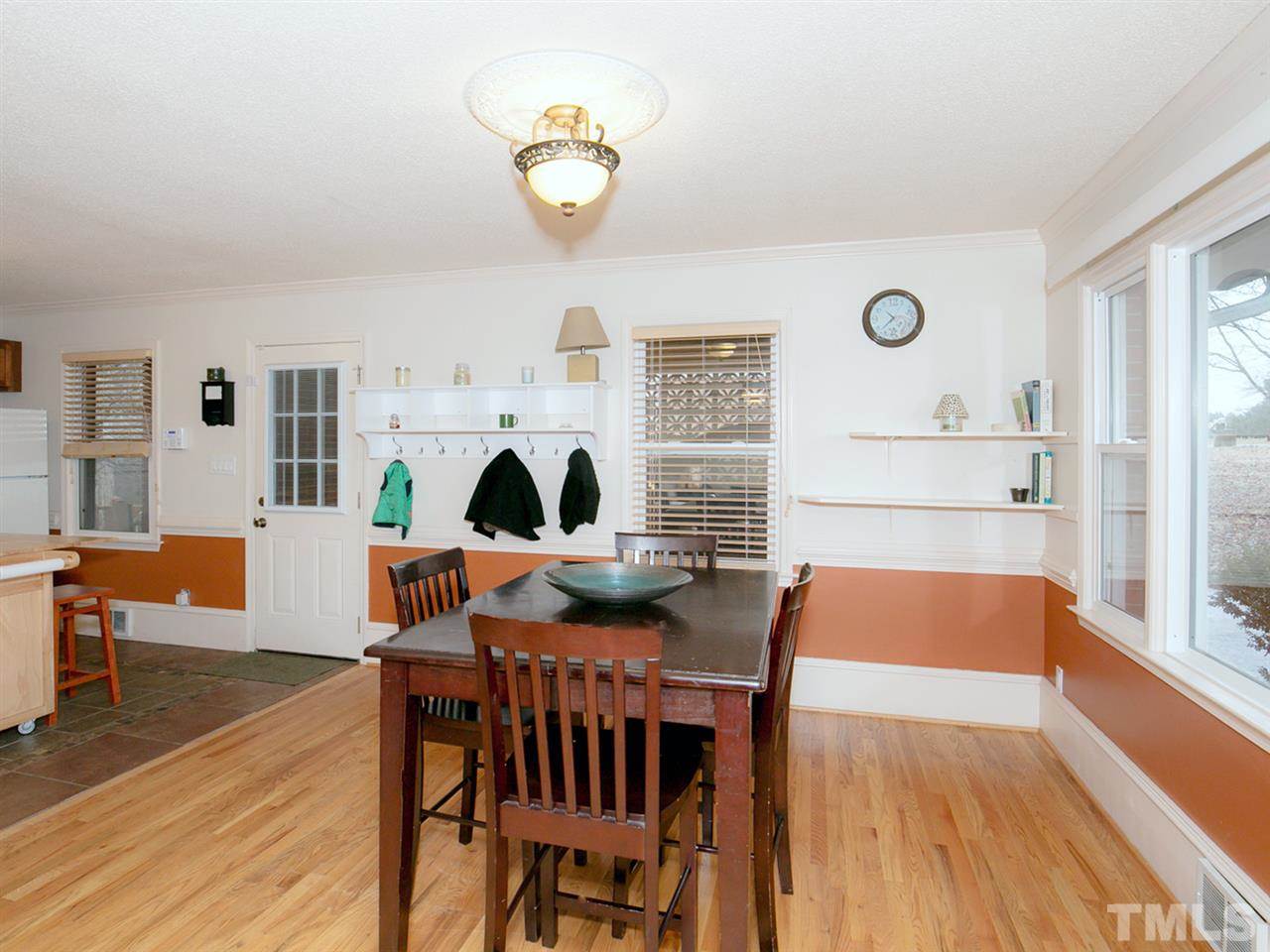 3628 Edgemont Road Wendell, NC 27591 - Photo 5 of 17 a view of a dining room with furniture and wooden floor