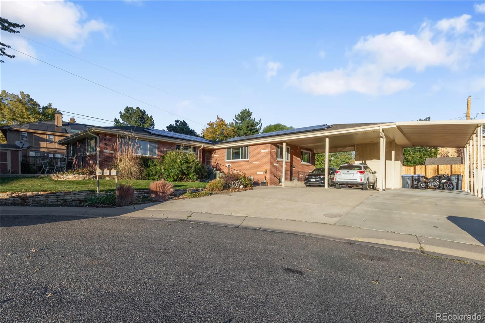 a view of a house with a street