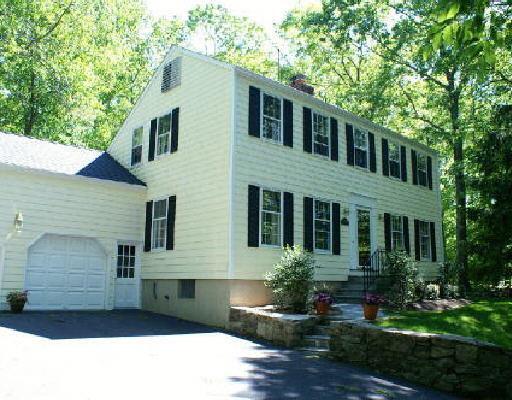 111 Mill Road Stamford, CT 06903 - Photo 1 of 1 a front view of a house with a yard