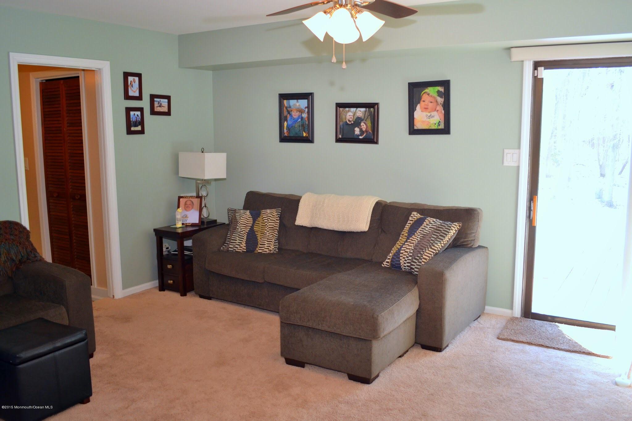 93 Starlight Road Howell, NJ 07731 - Photo 21 of 28 a living room with furniture and a window