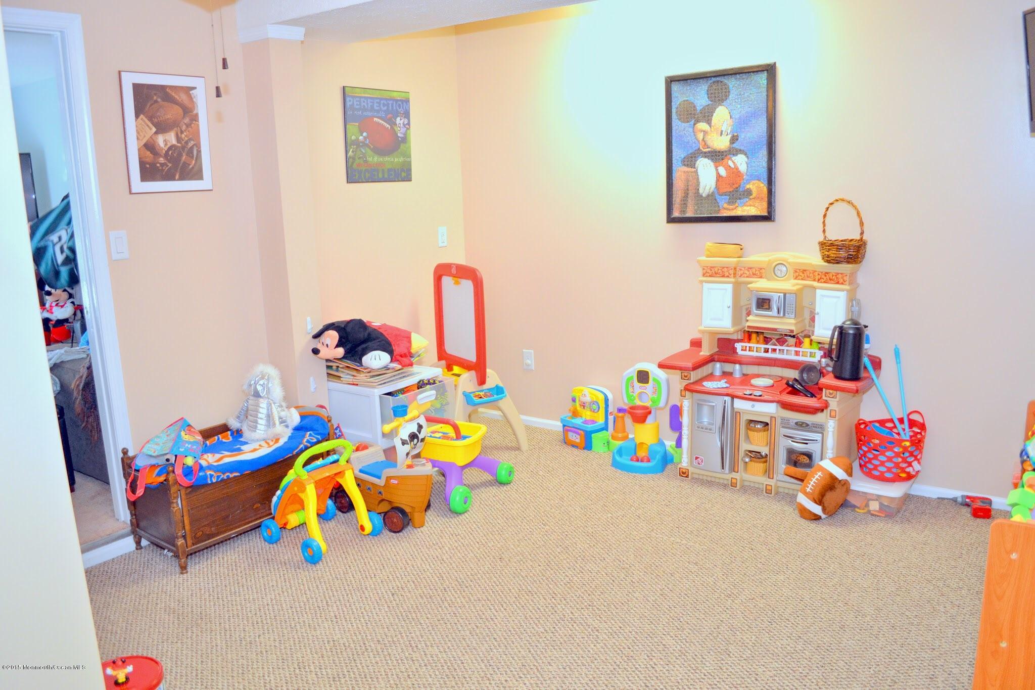 93 Starlight Road Howell, NJ 07731 - Photo 25 of 28 a children play room with toys