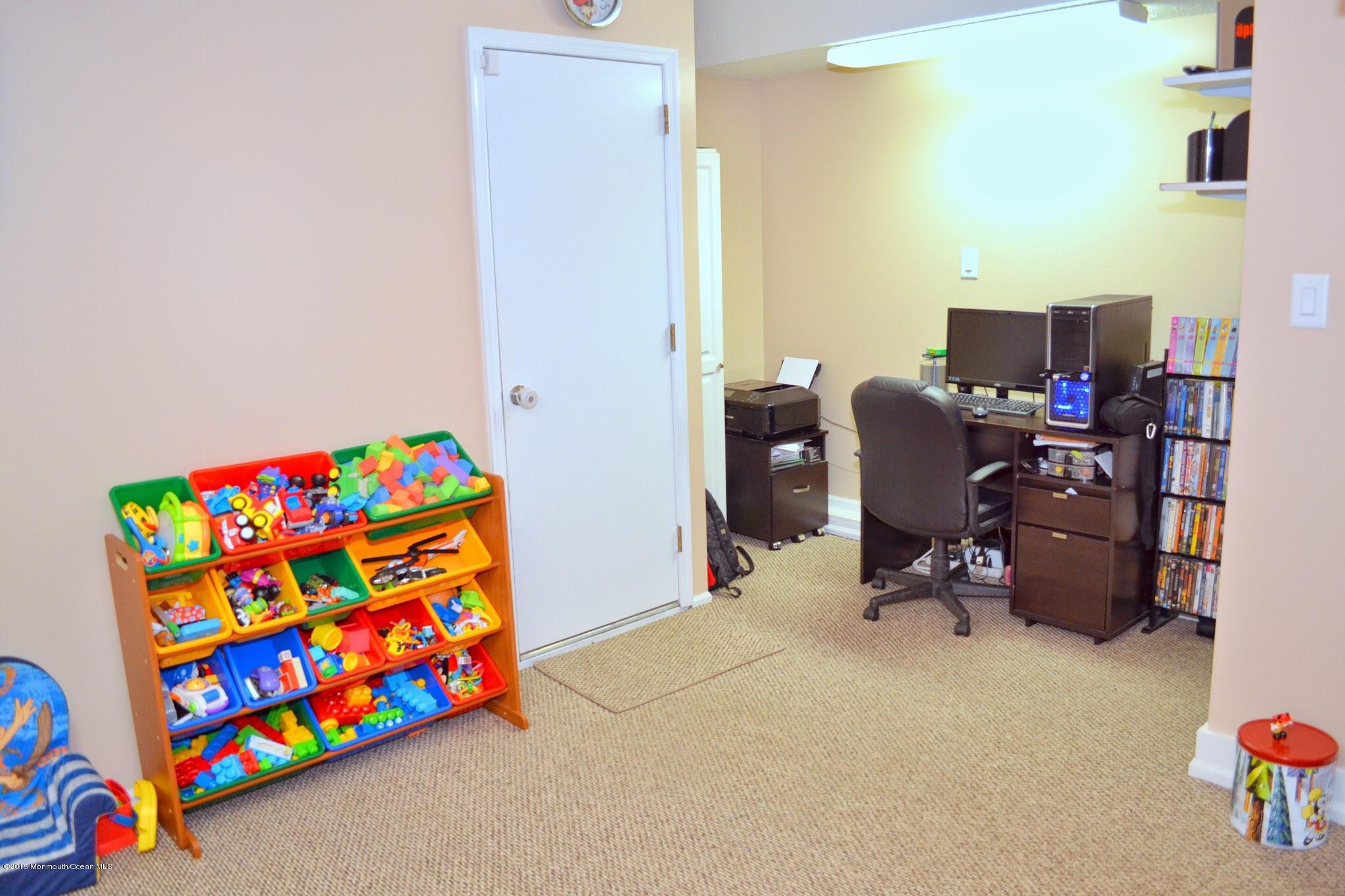 93 Starlight Road Howell, NJ 07731 - Photo 26 of 28 a room with toys and a small space