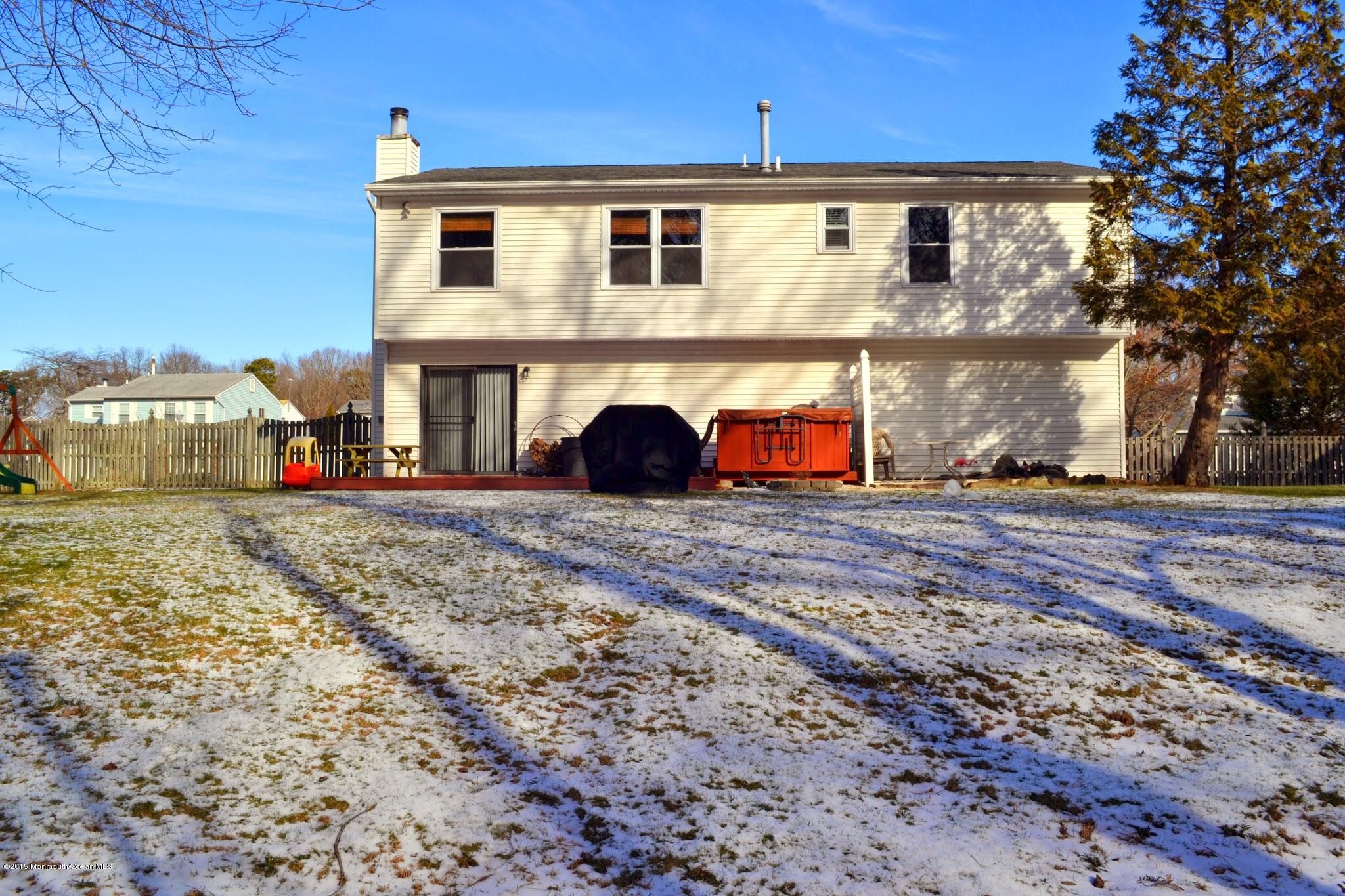 93 Starlight Road Howell, NJ 07731 - Photo 3 of 28 a view of front of house with a yard