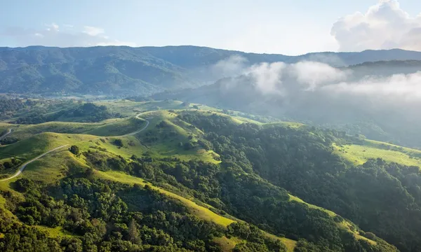 a view of lake and mountain