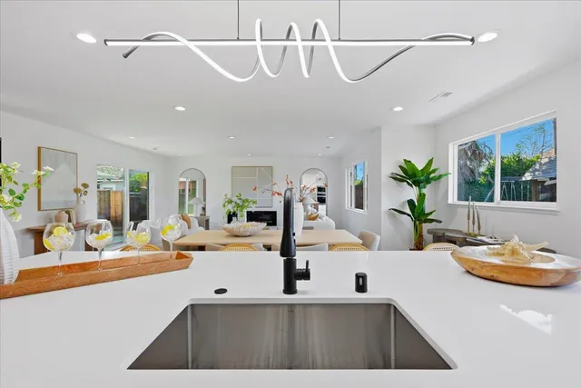 a kitchen with a table and chairs in it