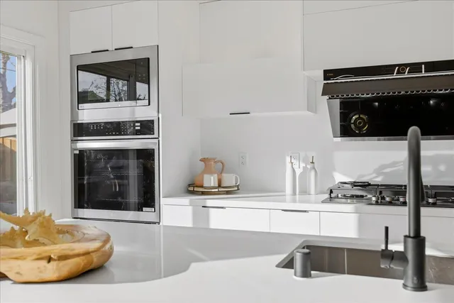 a view of a dining room with a table and chair