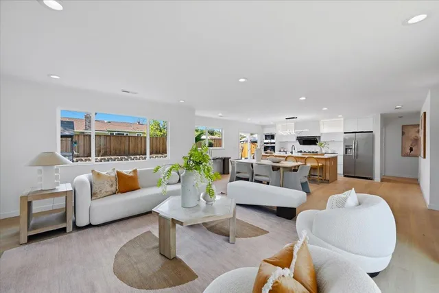 a view of a backyard with a tree