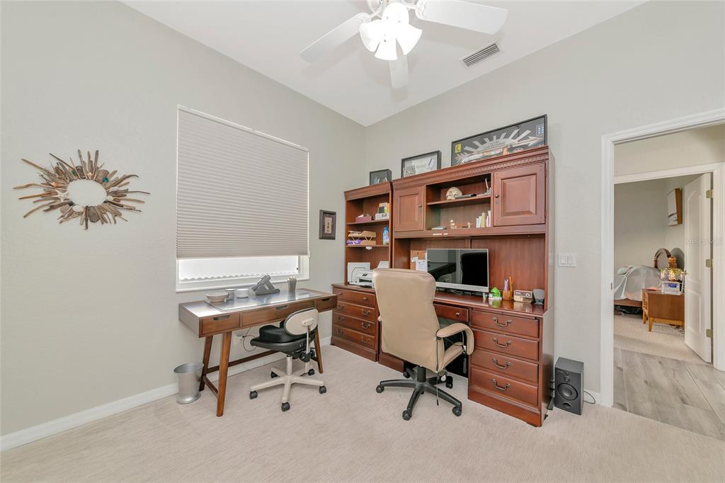 1019 Scherer Way Osprey, FL 34229 - Photo 22 of 56 a view of a workspace with furniture